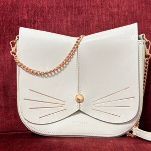 Ted Baker Cream Cat Crossbody Bag with Rose Gold Chain and Whisker Accents